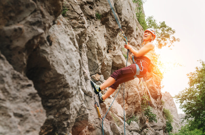 woman rock climbing