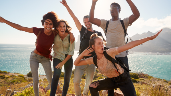 Friends posing for a photo after an epic hike