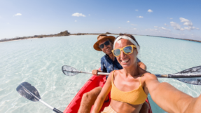 Couple taking selfie on kayak in the Caimans